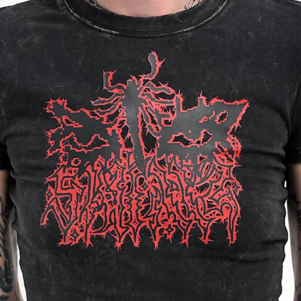 Black crop with red metal lettering